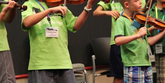 Violin players at Austin Suzuki Institute